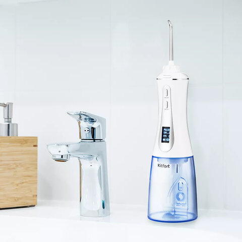 Ирригатор для полости рта KITFORT КТ-2913, портативный, емкость резервуара 0,35 л, 2 насадки, белый - фото 8