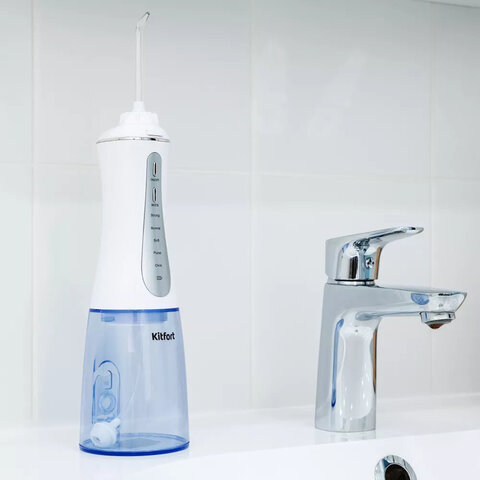 Ирригатор для полости рта KITFORT КТ-2915, портативный, емкость резервуара 0,35 л, 2 насадки, белый - фото 7