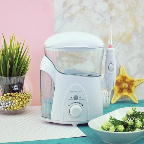 Ирригатор для полости рта REVYLINE RL 500, стационарный, емкость резервуара 0,6 л, 7 насадок, белый - фото 4