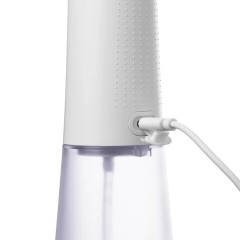 Ирригатор для полости рта REVYLINE RL 670, емкость резервуара 0,27 л, 2 насадки, белый, 9101 - фото 4